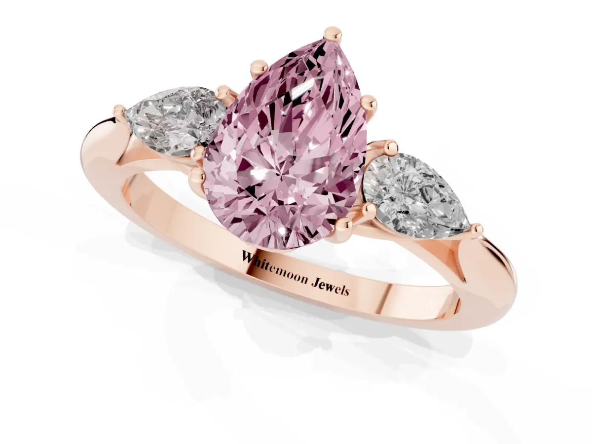 Fancy Pink Pear Cut Diamond Three-Stone Ring with Pear Side Stones and Prong Setting Rose gold