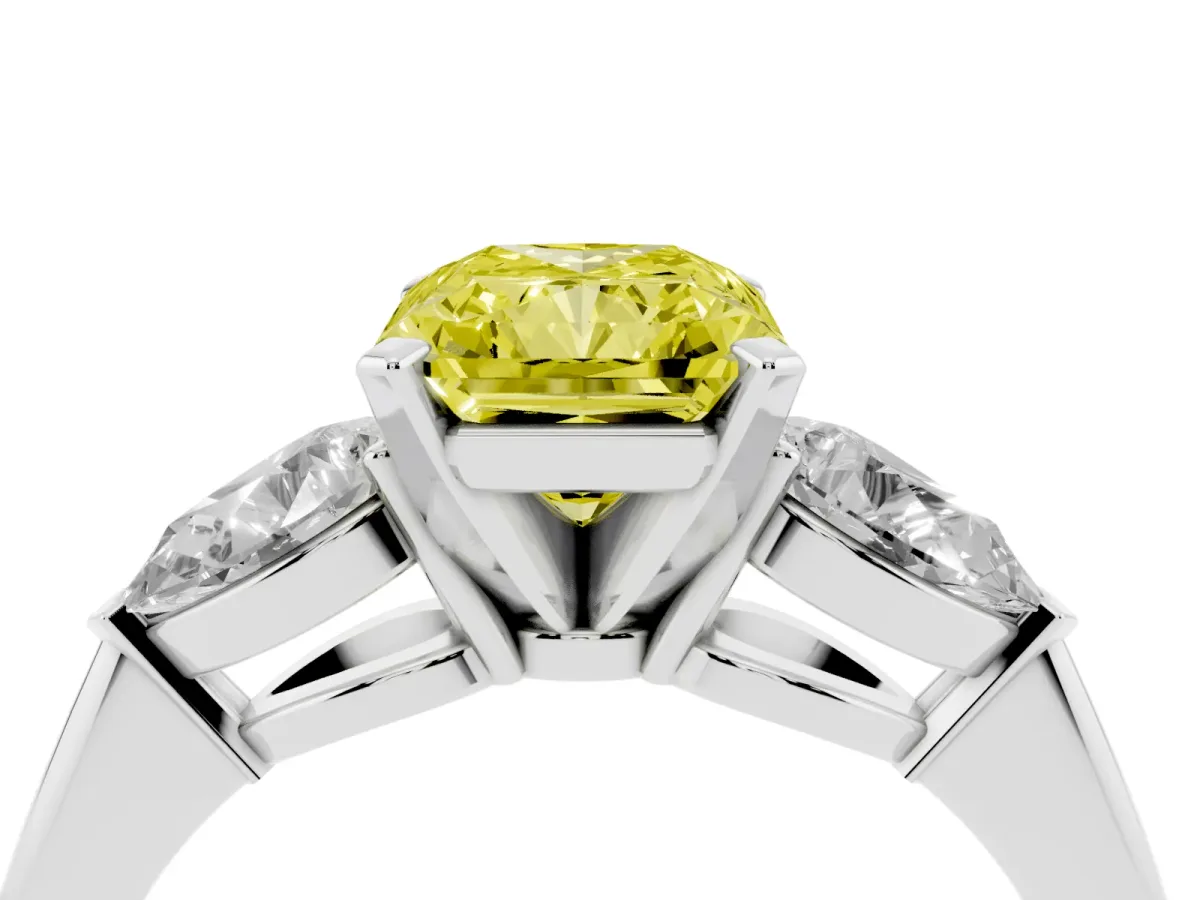Fancy Yellow Three-Stone Radiant Cut Diamond Ring with Pear Side Stones and Four-Prong Setting Silver
