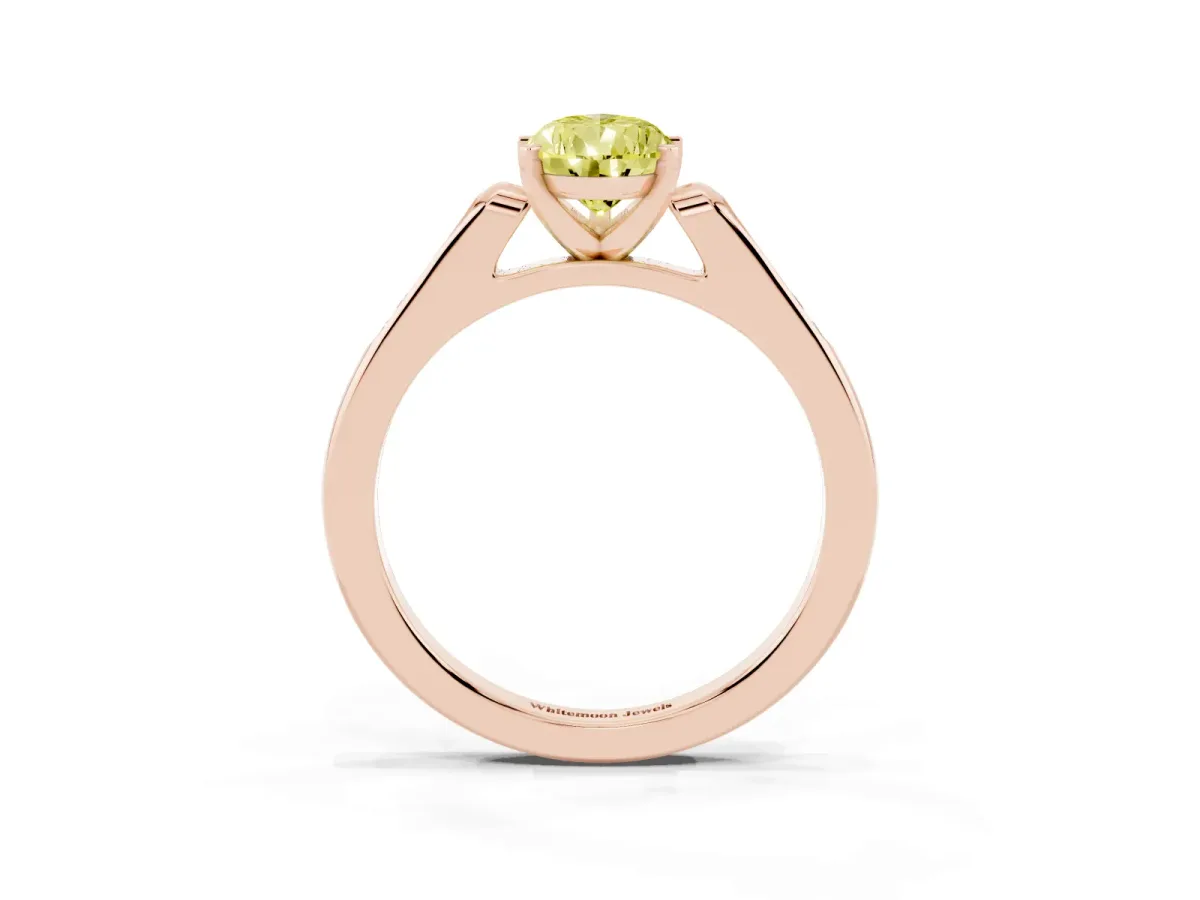 Fancy Yellow Pear Cut Diamond Solitaire Ring with Channel Set Round Band and Prong Setting Rose gold