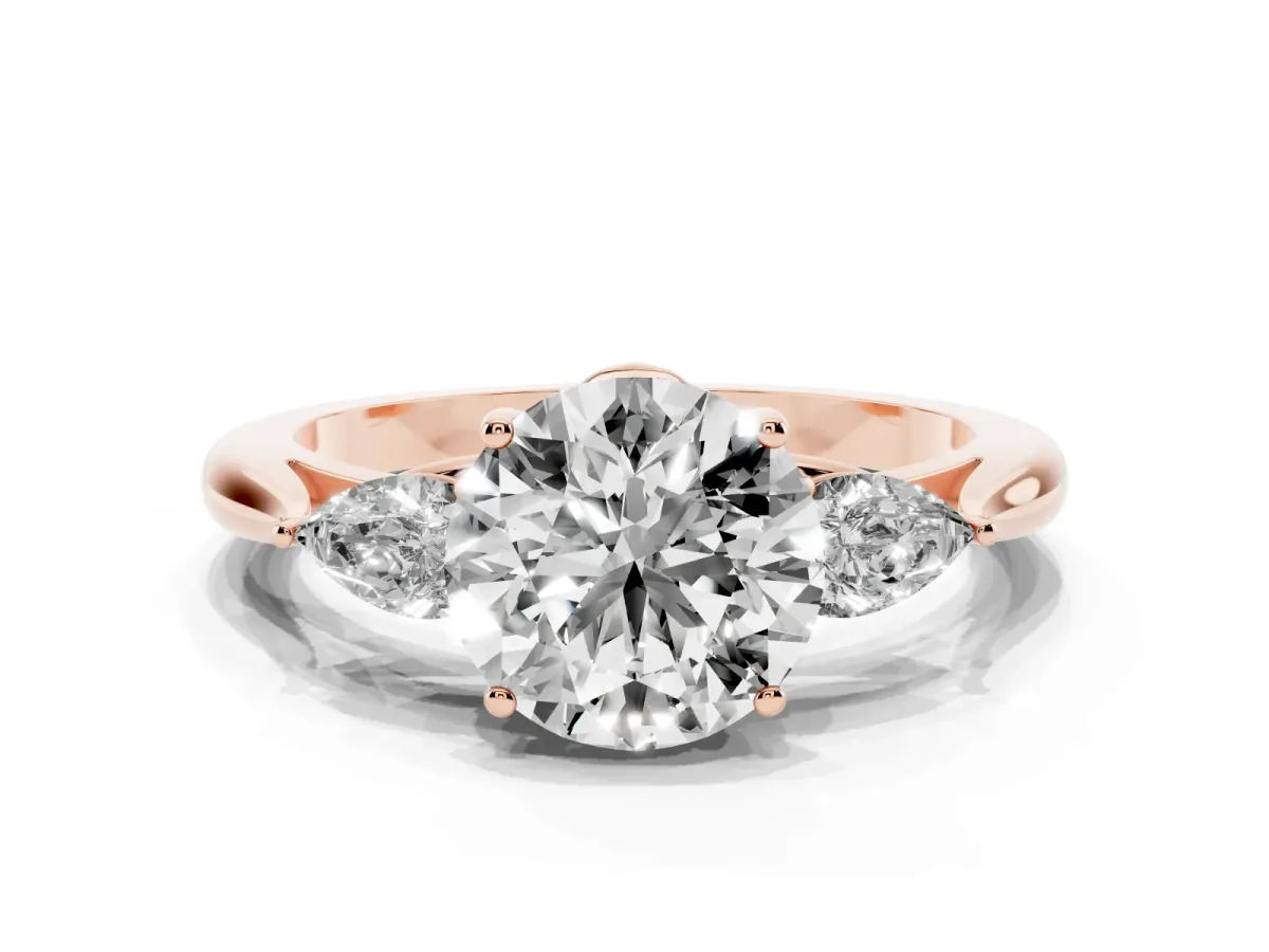 Three-Stone Round Cut Brilliant Diamond Solitaire Ring with Tapered Band and Four-Prong Setting Rose gold