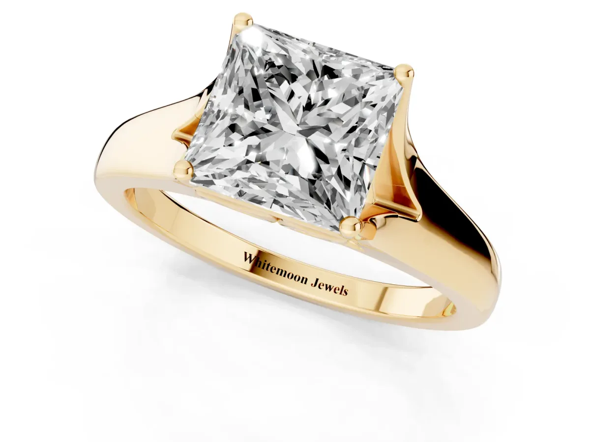 Princess Cut Solitaire Diamond Ring with Cathedral Band and Four-Prong Setting Yellow gold