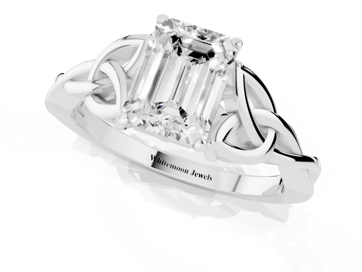 Emerald Cut Diamond Solitaire Engagement Ring with Celtic Knot Band and Four-Prong Setting Silver