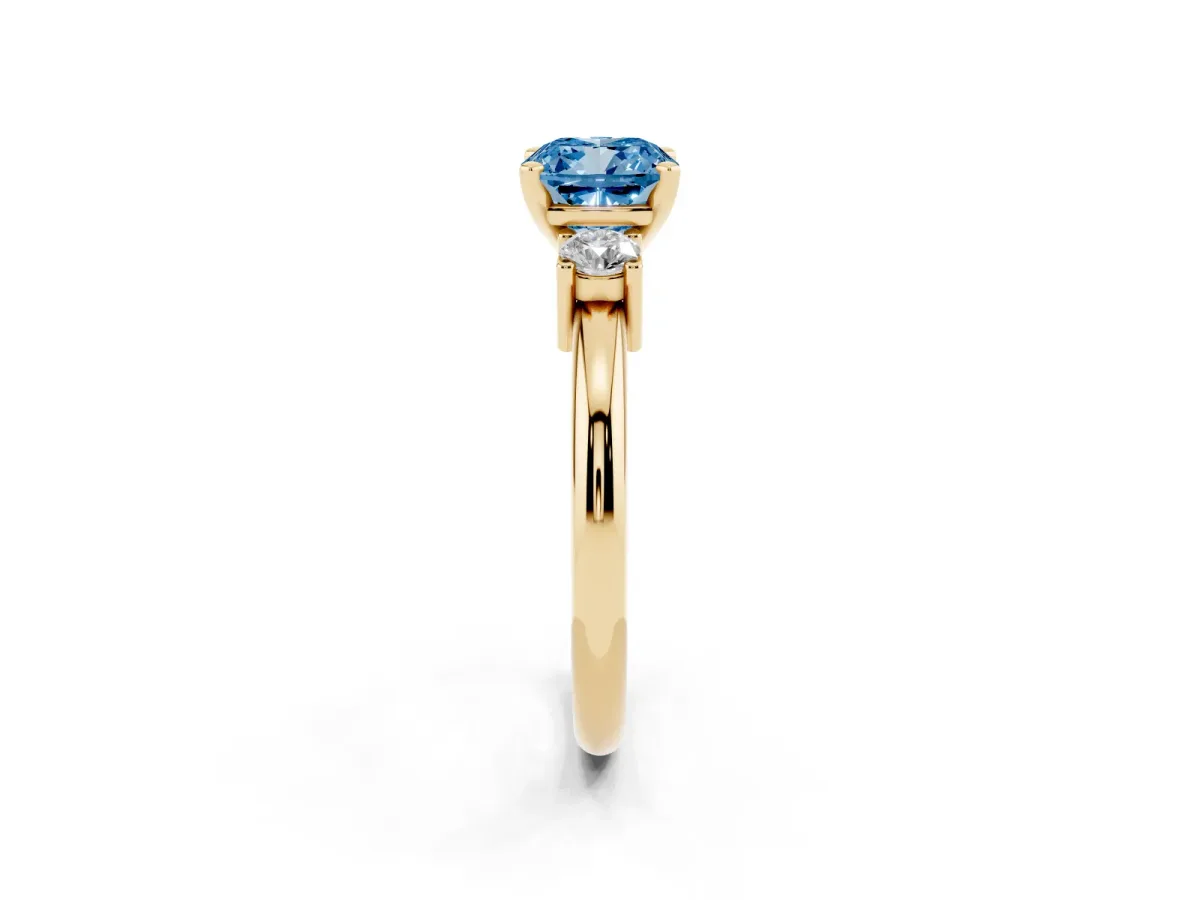 Fancy Blue Three-Stone Cushion Cut Cut Diamond Solitaire with Prong Setting and Classic Band Yellow gold