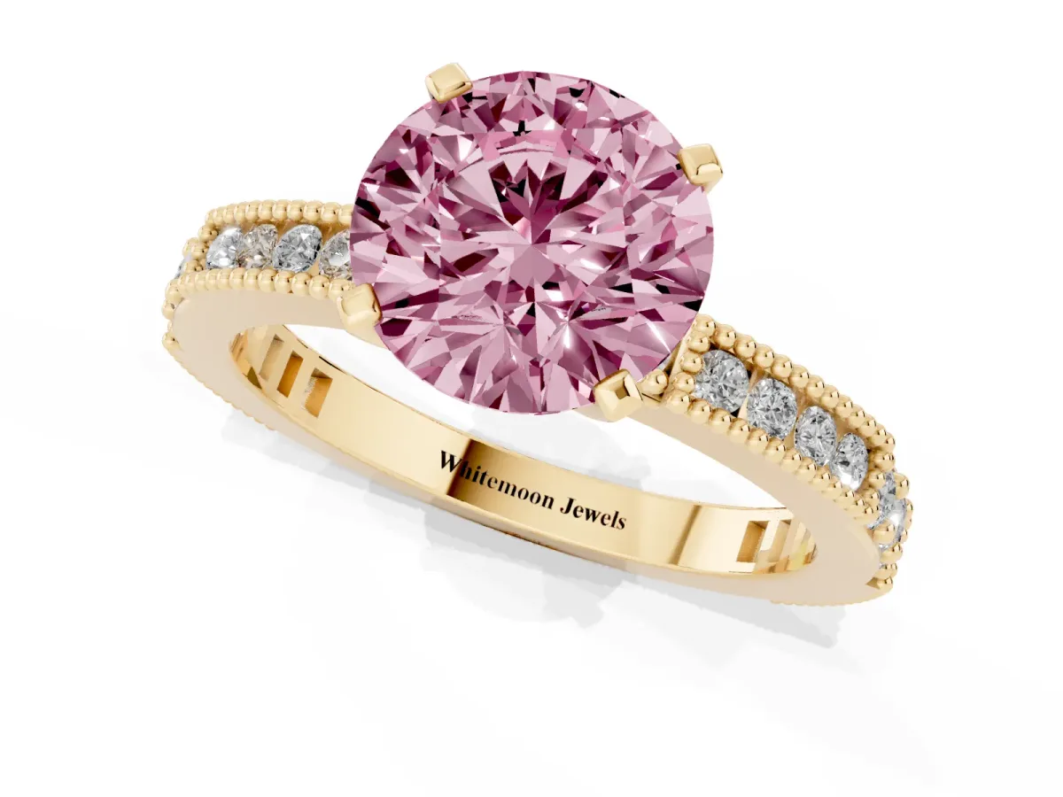 Fancy Pink Round Cut Solitaire with Pavé Band and Four-Prong Setting Yellow gold
