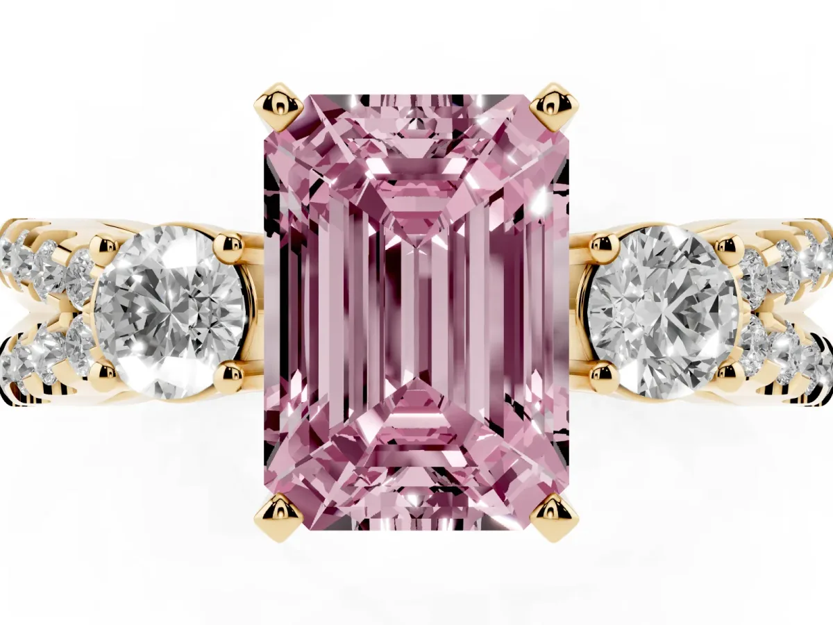 Fancy Pink Emerald Cut Diamond Three-Stone Ring with Pavé Split Shank and Four-Prong Setting Yellow gold