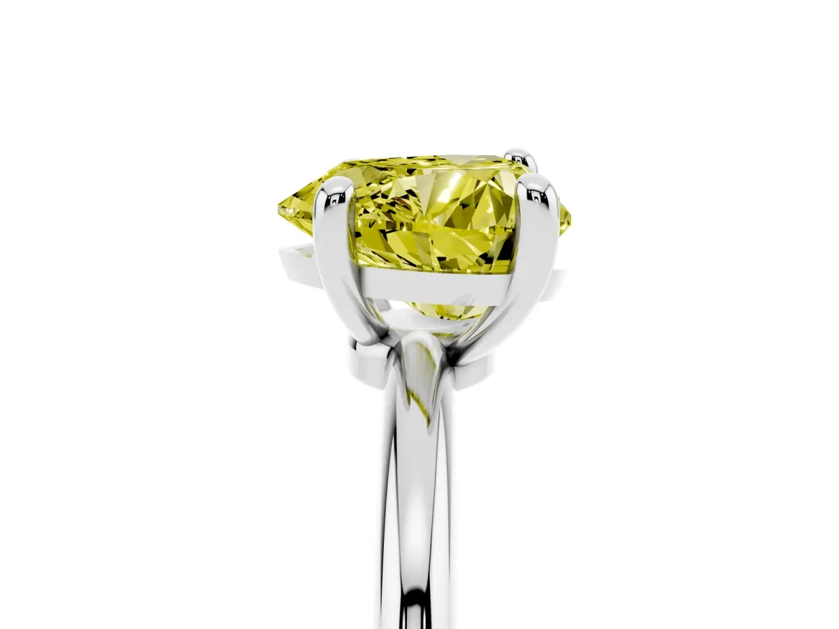 Fancy Yellow Heart Cut Solitaire Diamond Ring with 4-Prong Setting on a Classic Band Silver