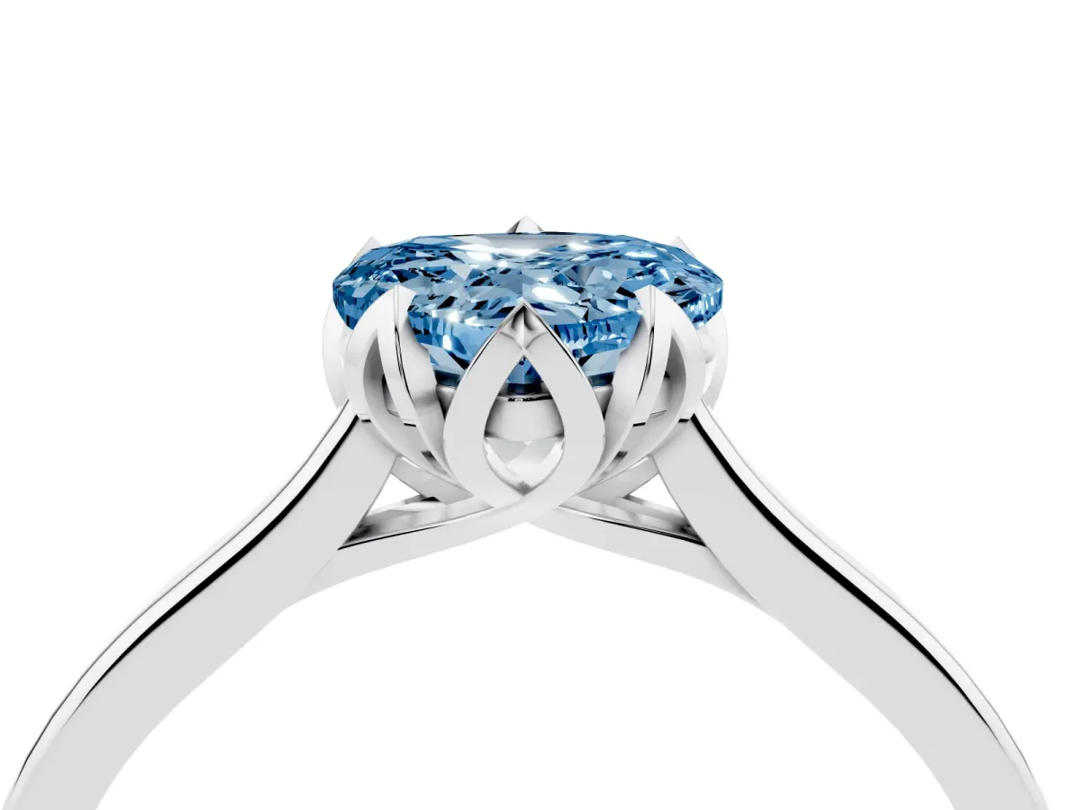 Fancy Blue Heart Cut Diamond Solitaire Ring with Flower Prong Setting and Classic Band Silver