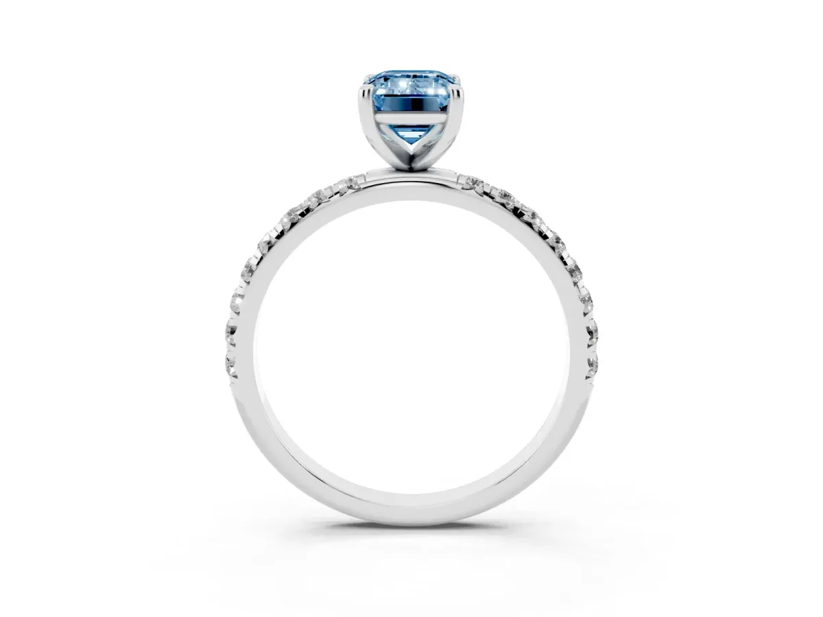 Fancy Blue Emerald Cut Cut Diamond Solitaire Ring with Micro Pave Band and Four Prong Setting Silver