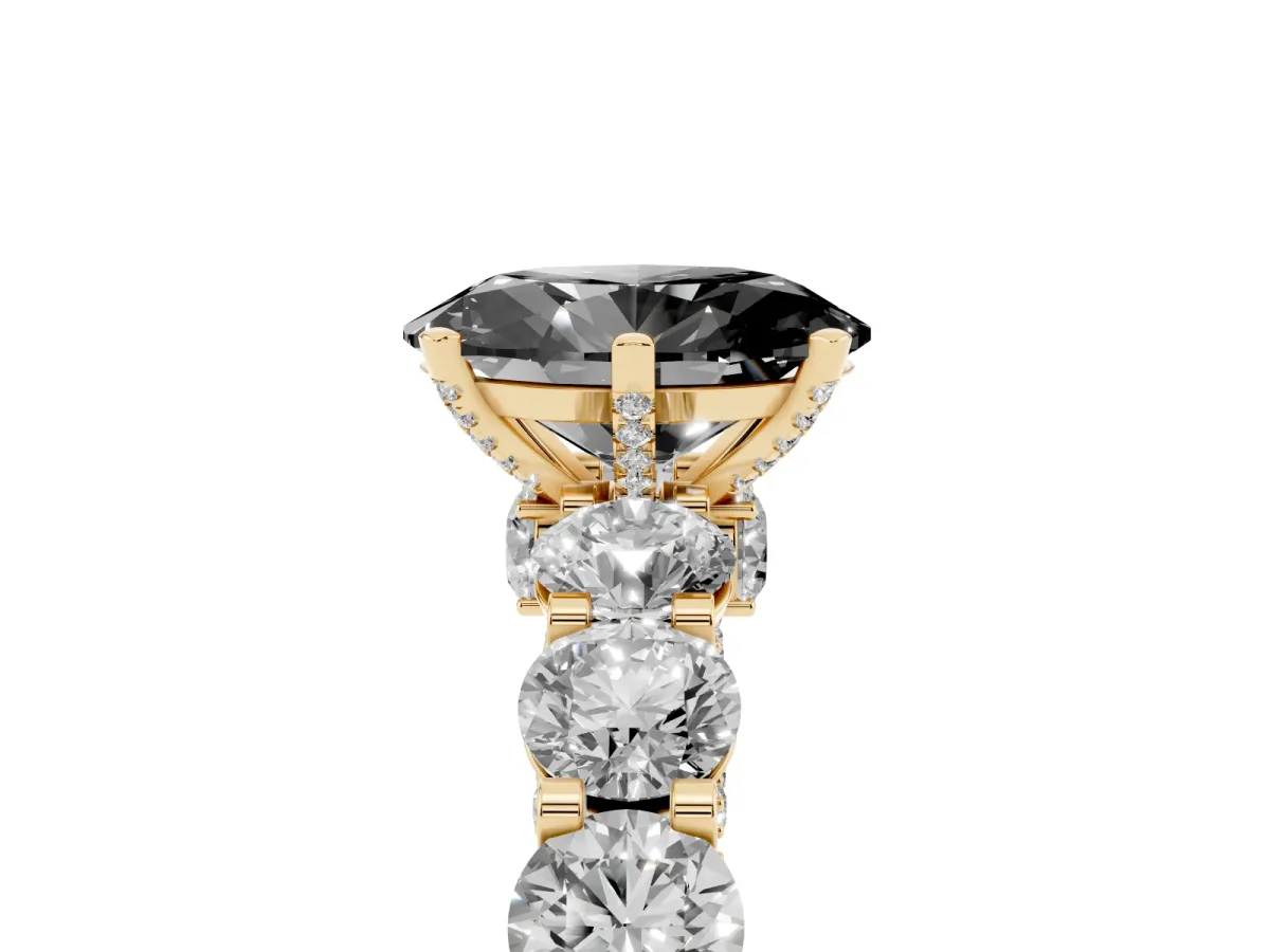 Fancy Black Oval Cut Diamond Side Stone Engagement Ring with Four-Prong Setting Yellow gold