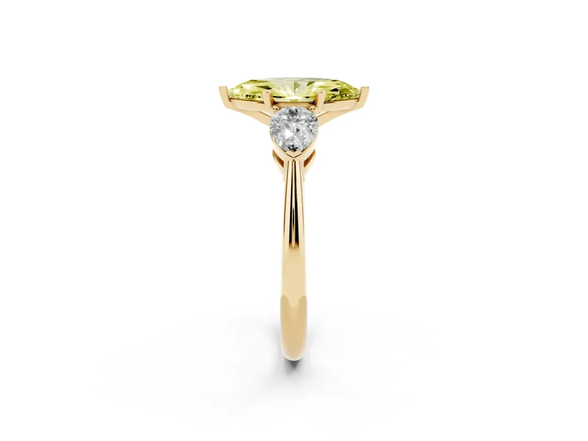 Fancy Yellow Three-Stone Marquise Cut Diamond Ring with Pear Side Stones and Four-Prong Setting Yellow gold