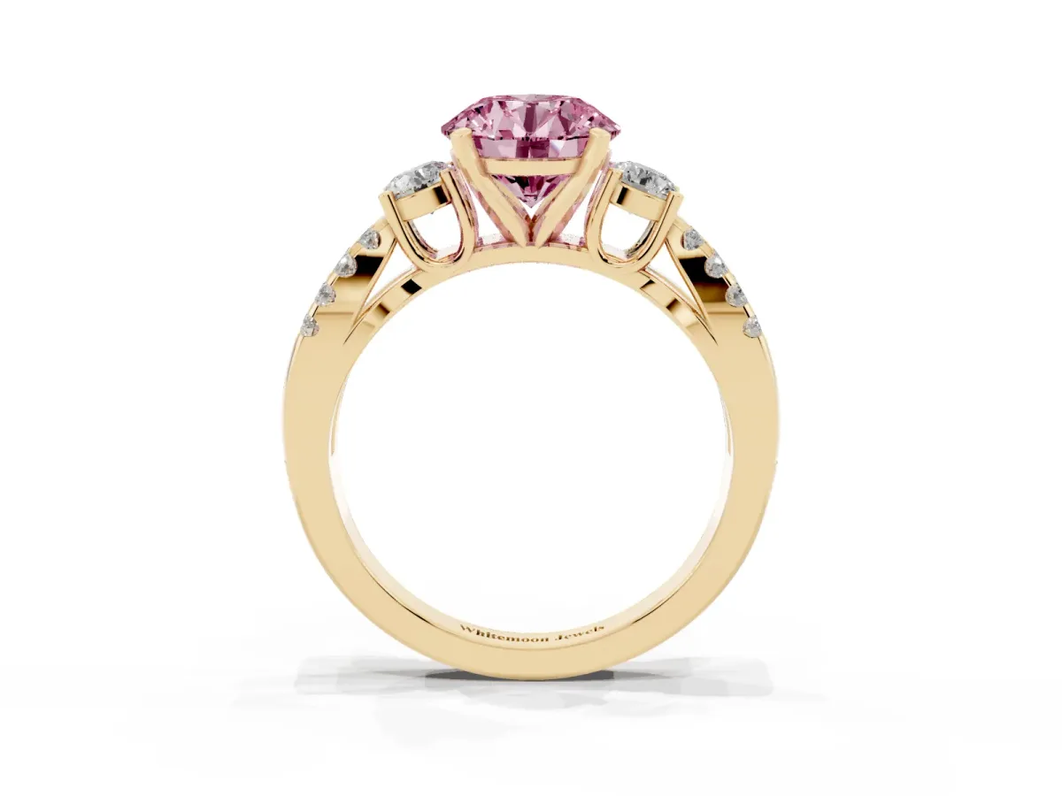 Fancy Pink Round Cut Diamond Three-Stone Ring with Pavé Split Shank and Four-Prong Setting Yellow gold