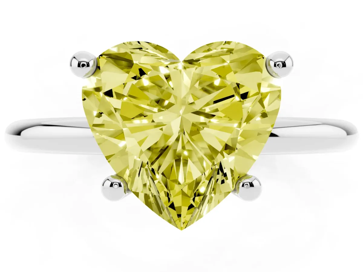 Fancy Yellow Heart Cut Solitaire Diamond Ring with 4-Prong Setting on a Classic Band Silver