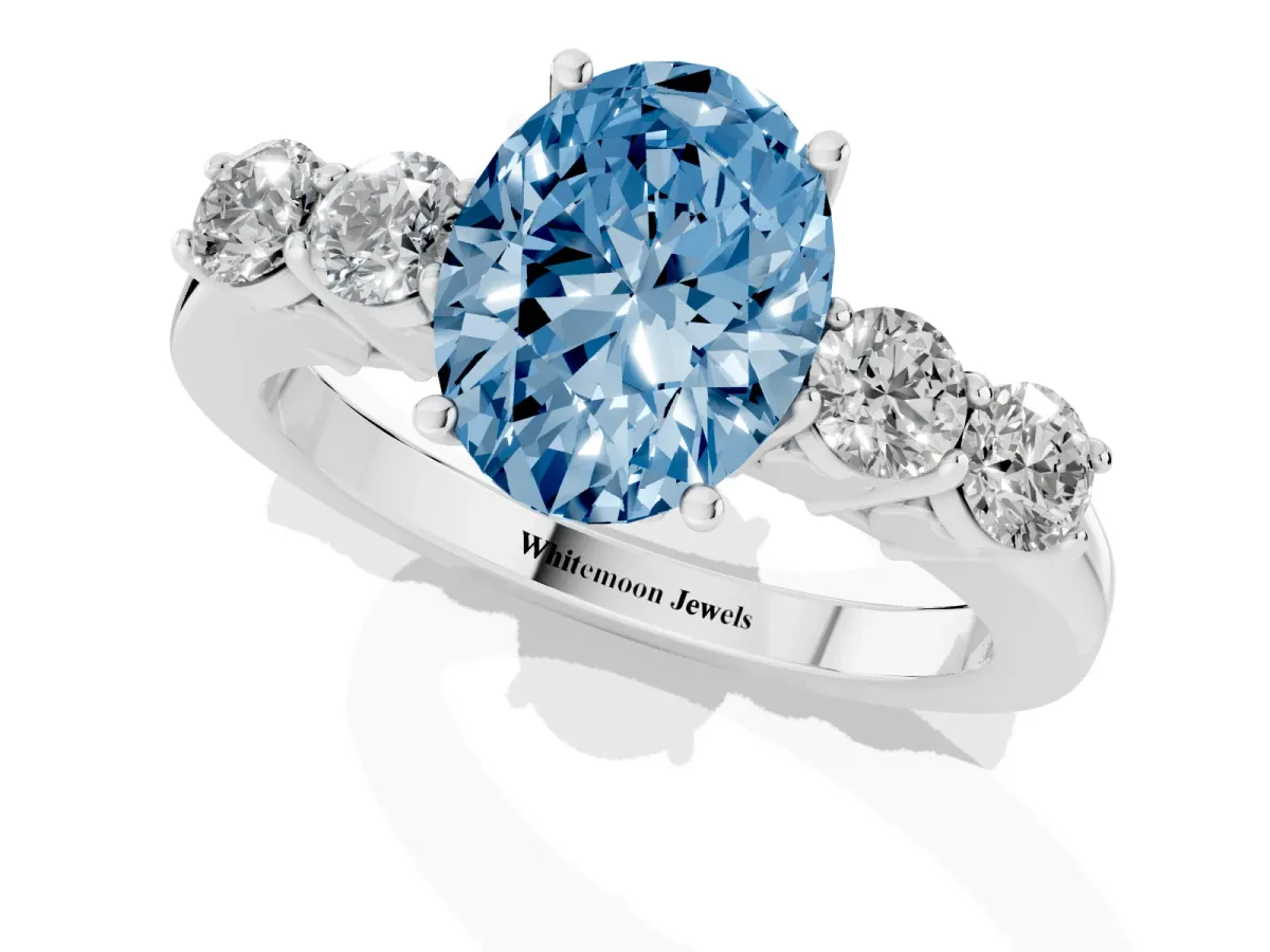Fancy Blue Oval Cut Cut Diamond Five-Stone Prong Set White Gold Ring Silver