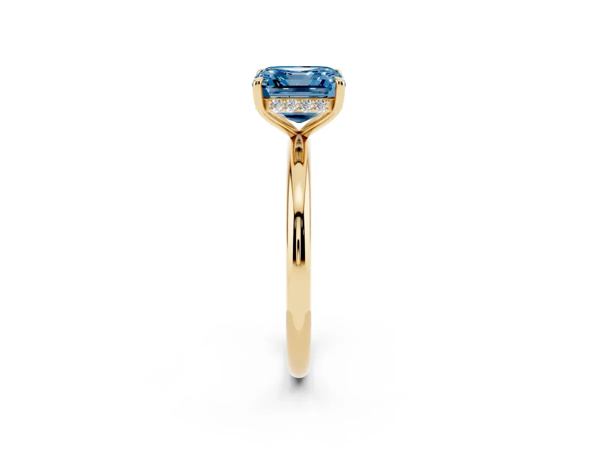 Fancy Blue Asscher Cut Diamond Solitaire Ring with Thin Band and Four-Prong Setting Yellow gold