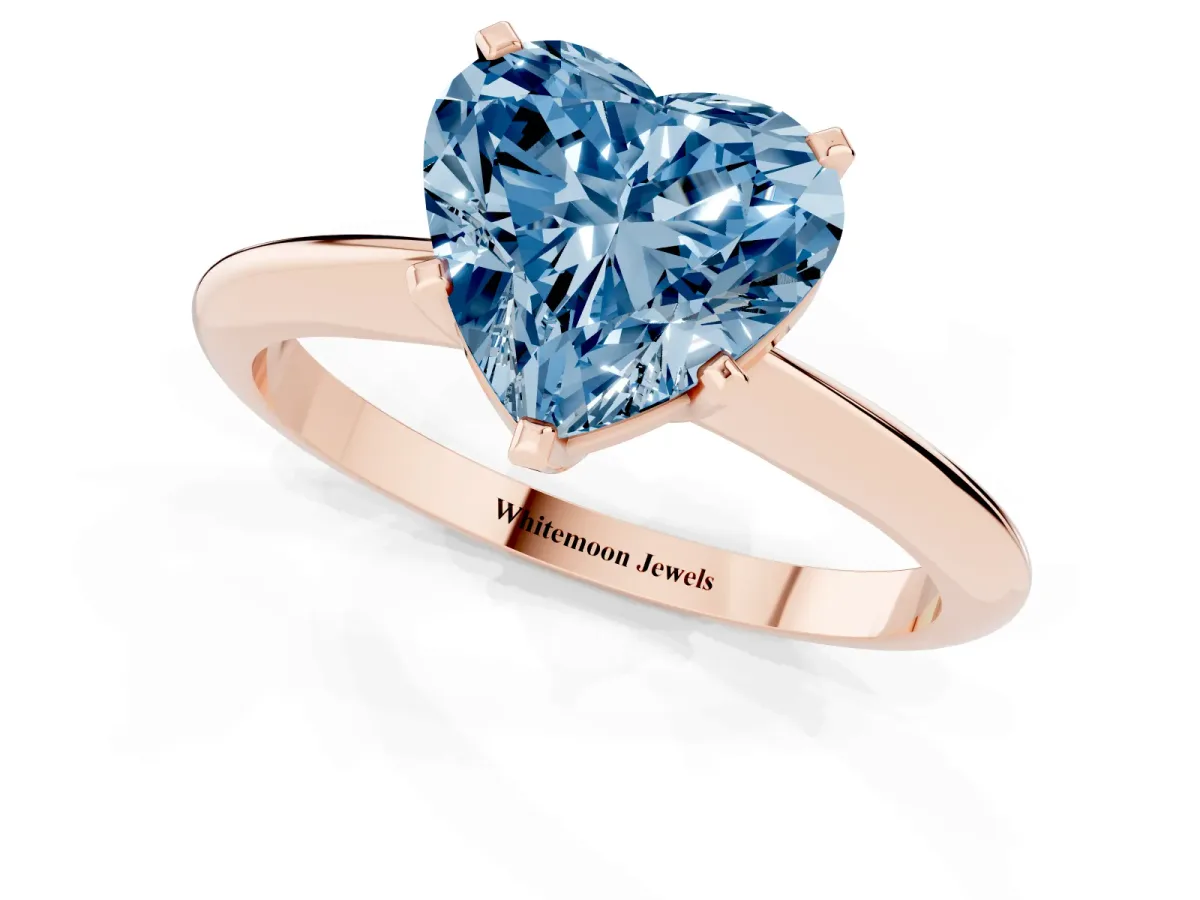 Fancy Blue Heart Cut Cut Solitaire Ring with Four-Prong Setting on a Classic Band Rose gold