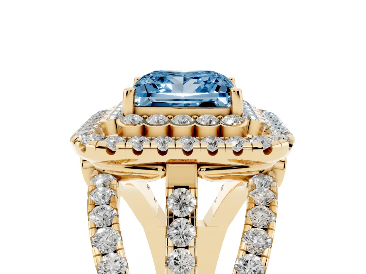 Fancy Blue Princess Cut Diamond Double Halo Ring with Round Pavé Split Shank and Prong Setting Yellow gold