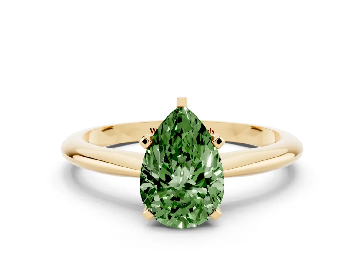 Fancy Green Pear Cut Cut Solitaire Ring with Four-Prong Setting on a Classic Band Yellow gold
