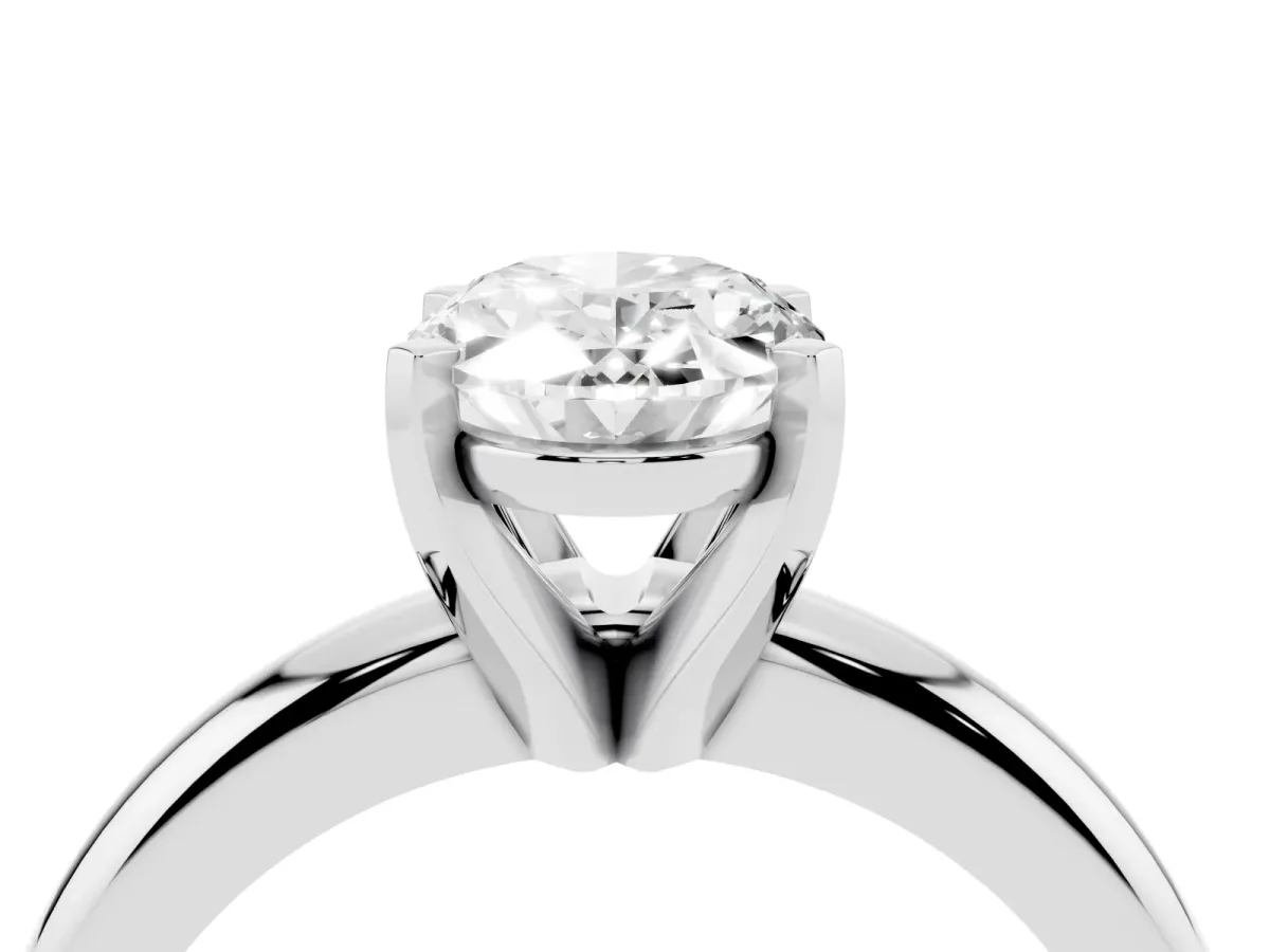 Oval Cut Diamond Solitaire Engagement Ring with Round Band and Four-Prong Setting Platinum