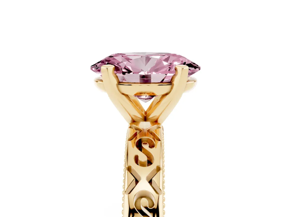 Fancy Pink Oval Cut Solitaire Engagement Ring with Scrollwork Band and Four-Prong Setting Yellow gold