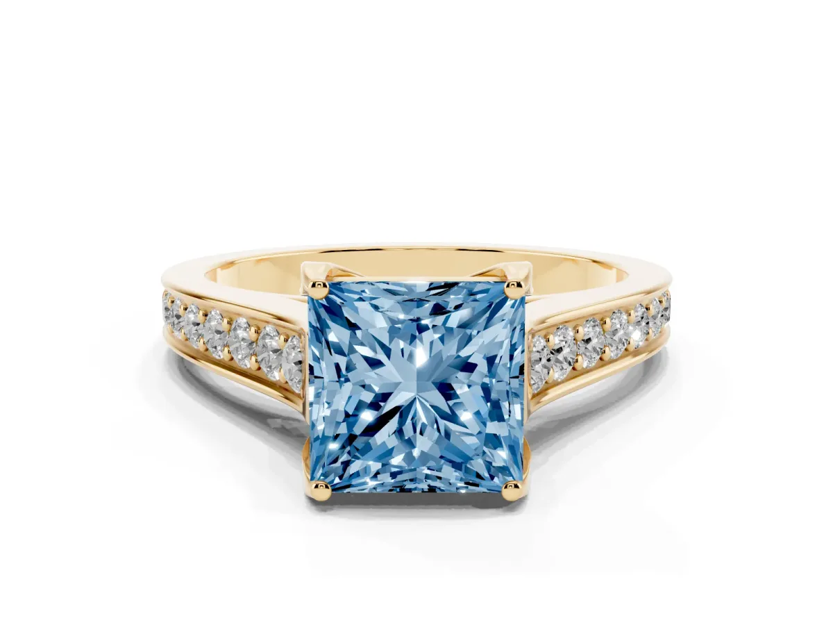 Fancy Blue Princess Cut Brilliant Cut Diamond Engagement Ring with Pavé Band and Four-Prong Setting Yellow gold
