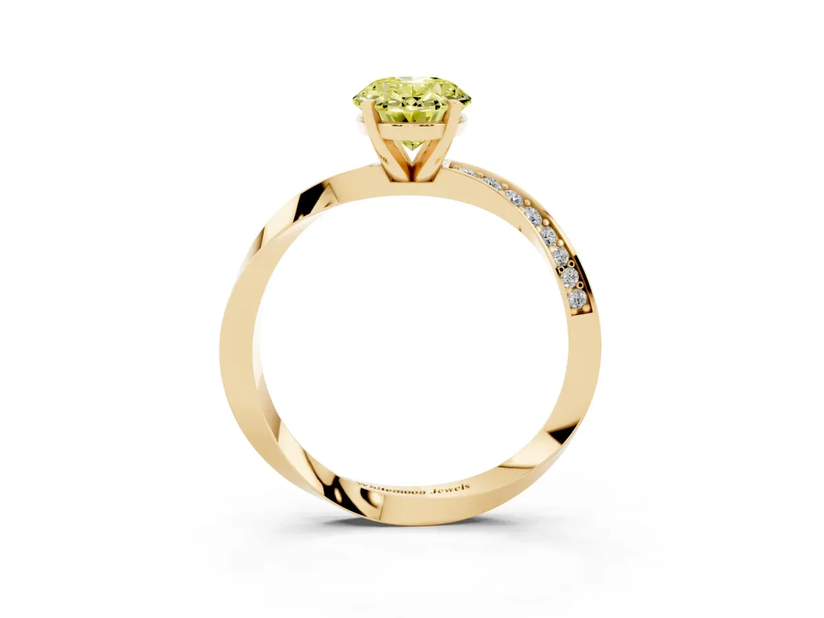 Fancy Yellow Oval Cut Diamond Engagement Ring with Side Stone Accents and Four-Prong Setting Yellow gold