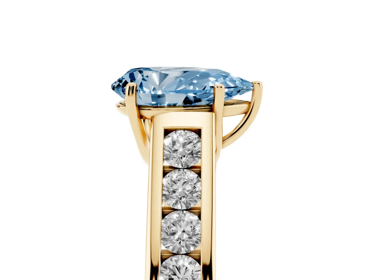 Fancy Blue Pear Cut Solitaire Channel-Set Diamond Engagement Ring with Four-Prong Setting Yellow gold