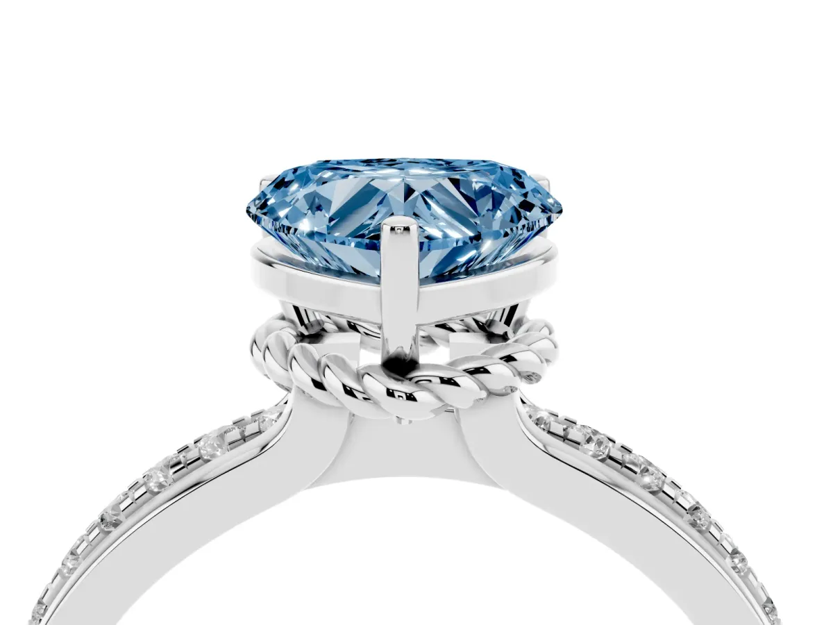 Fancy Blue Heart Cut Solitaire Diamond Ring with Channel Set Band and Six-Prong Setting Platinum