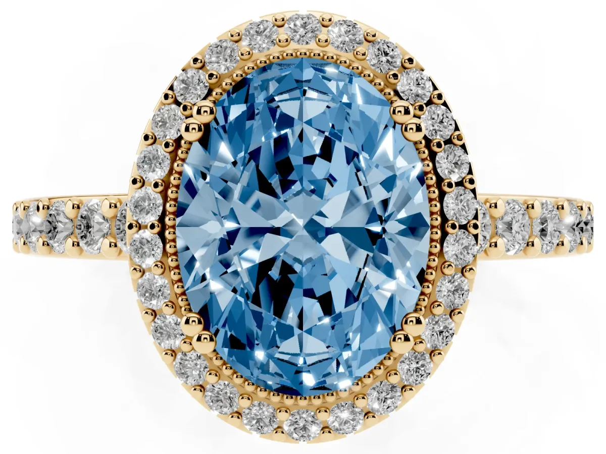 Fancy Blue Oval Cut Cut Diamond Halo Engagement Ring with Milgrain Detail and Pavé Band Yellow gold