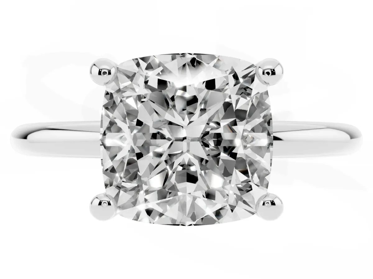 Cushion Cut Solitaire Diamond Ring with 4-Prong Setting on a Classic Band Silver