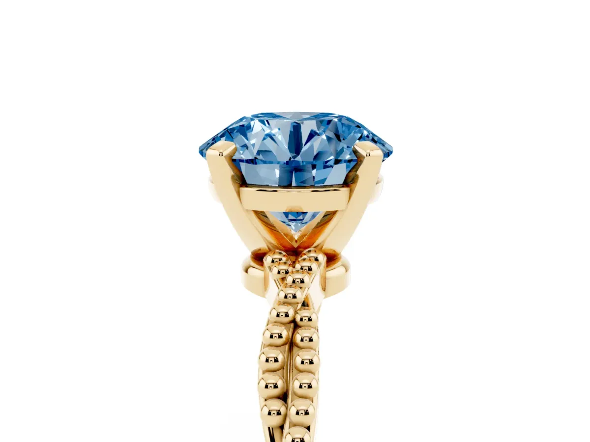 Fancy Blue Round Cut Solitaire Twisted Band with Bead Prong Setting Yellow gold