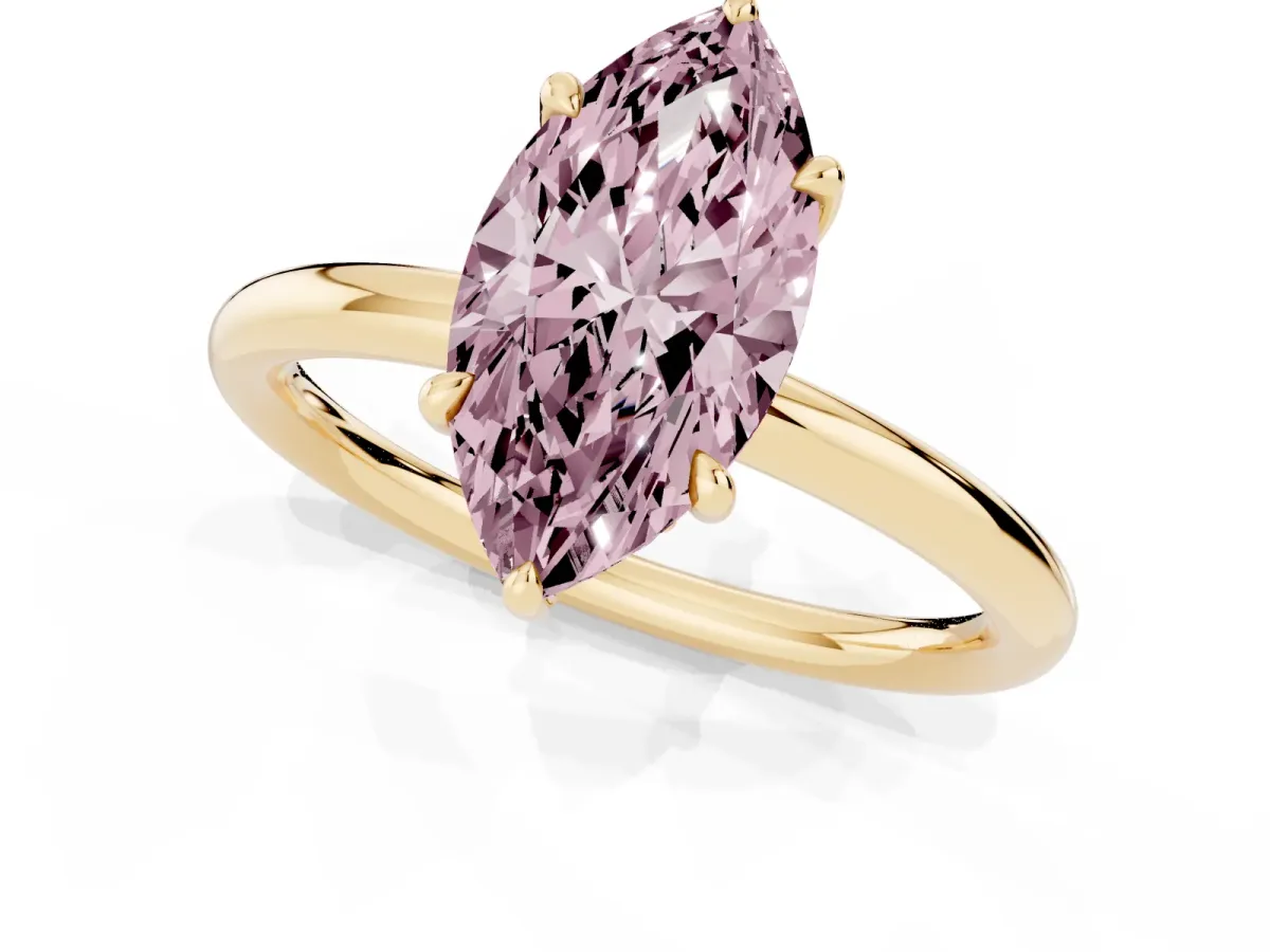 Fancy Pink Marquise Cut Diamond Solitaire Ring with Thin Band and Four-Prong Setting Yellow gold