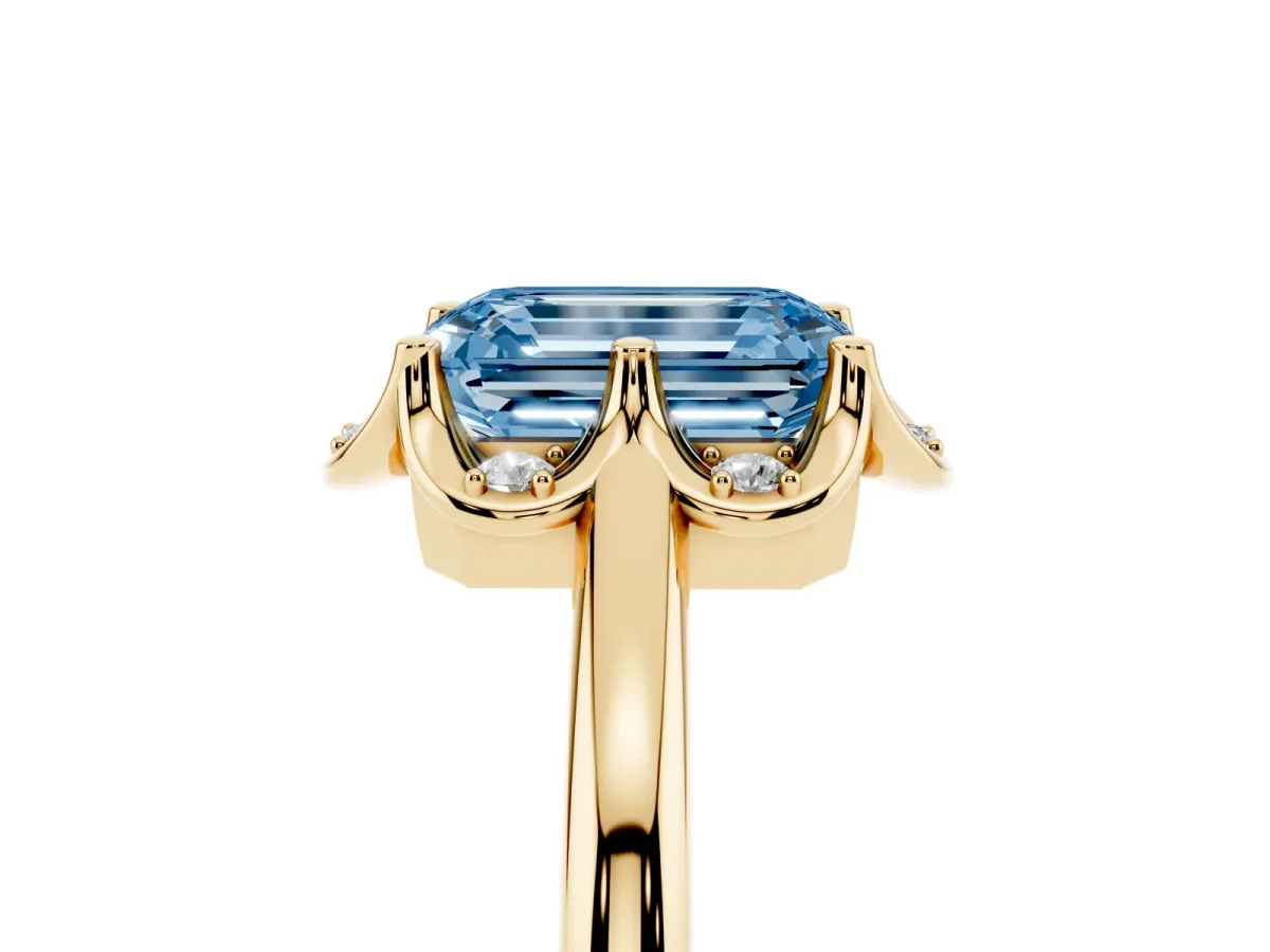 Fancy Blue Emerald Cut Halo Diamond Ring with Round Cluster Setting, Solitaire Band, and Four-Prong Setting Yellow gold