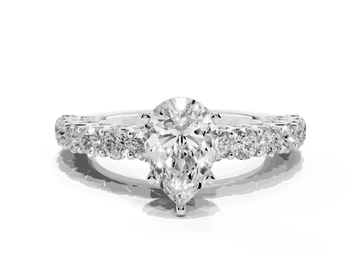 Pear Cut Diamond Solitaire Ring with Shared Prong Pavé Band and Four-Prong Setting Silver