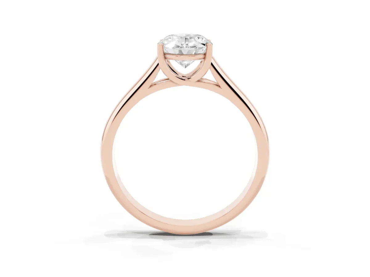 Oval Cut Solitaire Engagement Ring with Tapered Band and Four-Prong Setting Rose gold