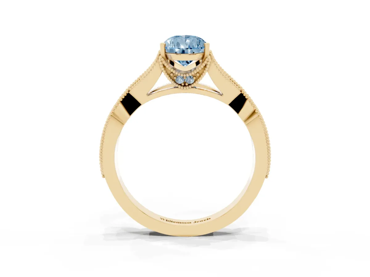 Fancy Blue Pear Cut Cut Diamond Twisted Band with Milgrain Pave Setting and Four-Prong Setting Yellow gold