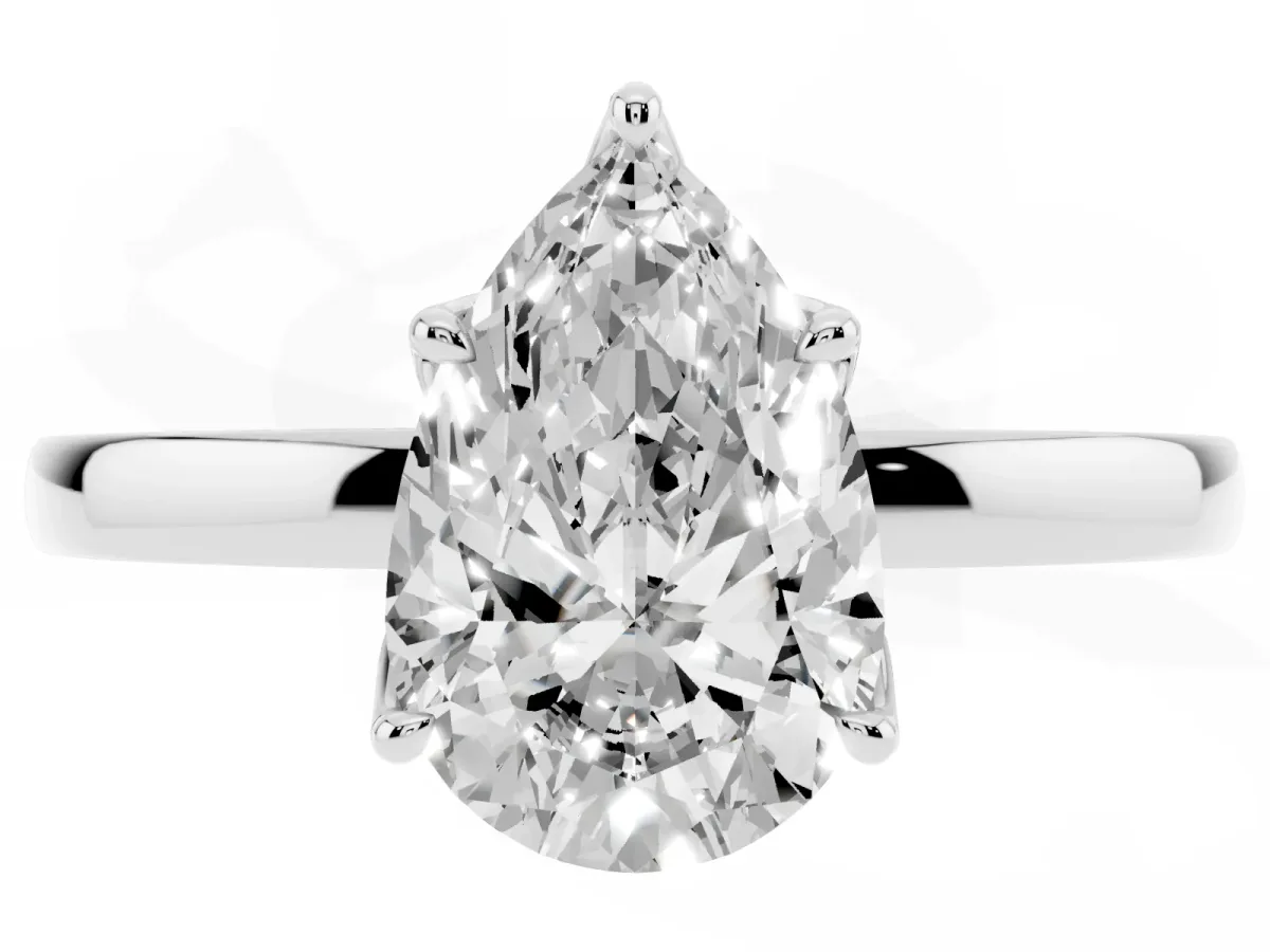 Pear Cut Diamond Solitaire Ring with Thin Band and Prong Setting Platinum