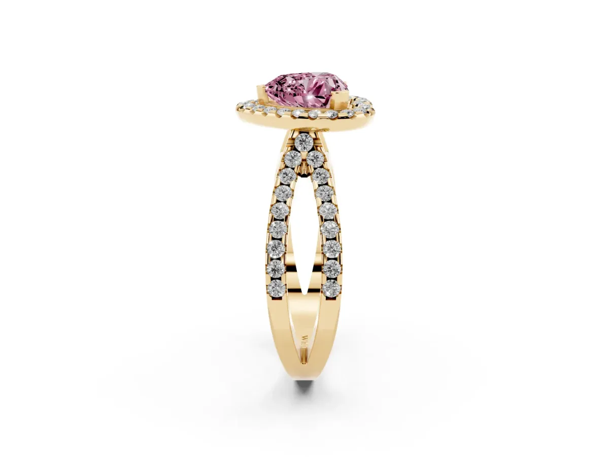 Fancy Pink Heart Cut Diamond Halo Ring with Split Shank Pavé Band and Prong Setting Yellow gold