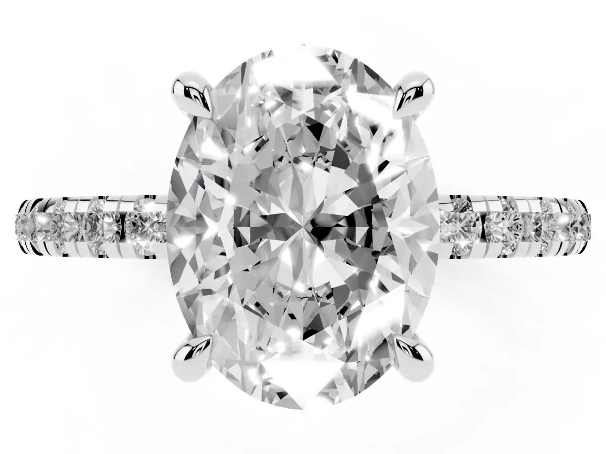 Oval Cut Diamond Brilliant Solitaire Ring with Pavé Band and Four-Prong Setting Silver
