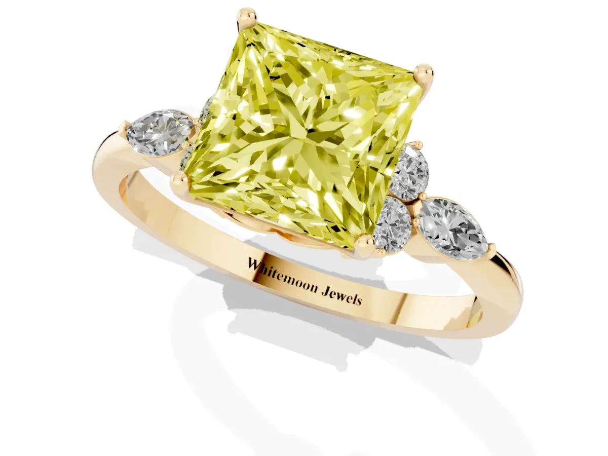 Fancy Yellow Princess Cut Brilliant Diamond Solitaire Ring with Pear Side Stones and Four-Prong Setting Yellow gold