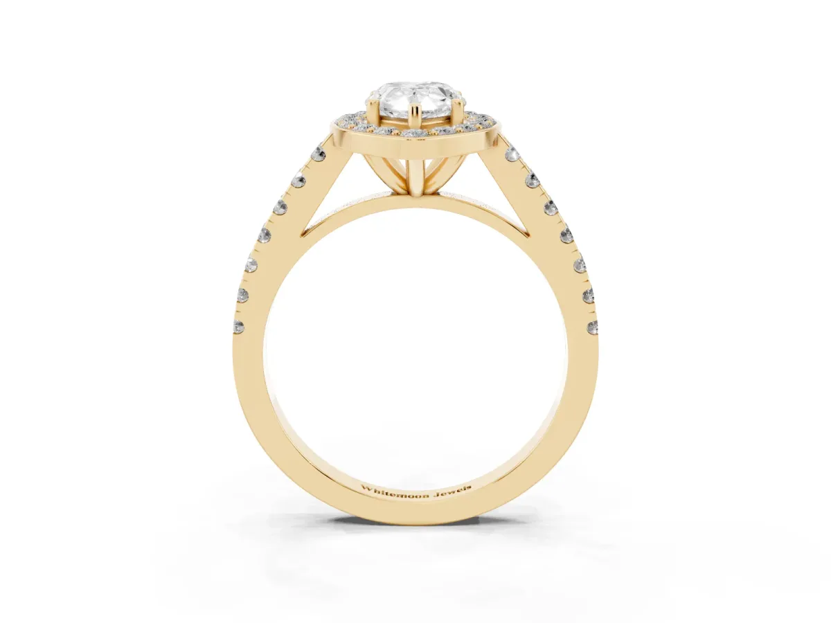 Pear Cut Diamond Halo Ring with Round Pavé Split Shank and Prong Setting Yellow gold