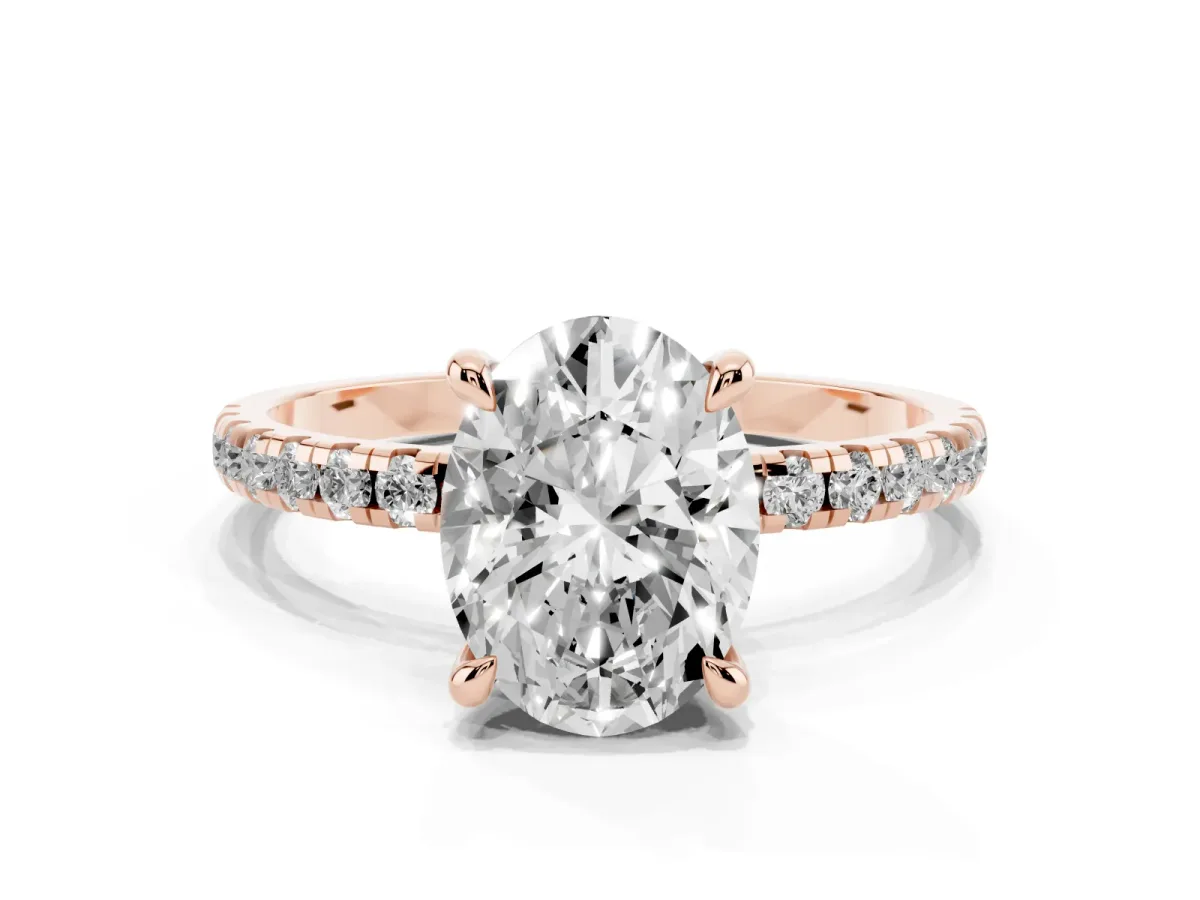 Oval Cut Diamond Brilliant Solitaire Ring with Pavé Band and Four-Prong Setting Rose gold