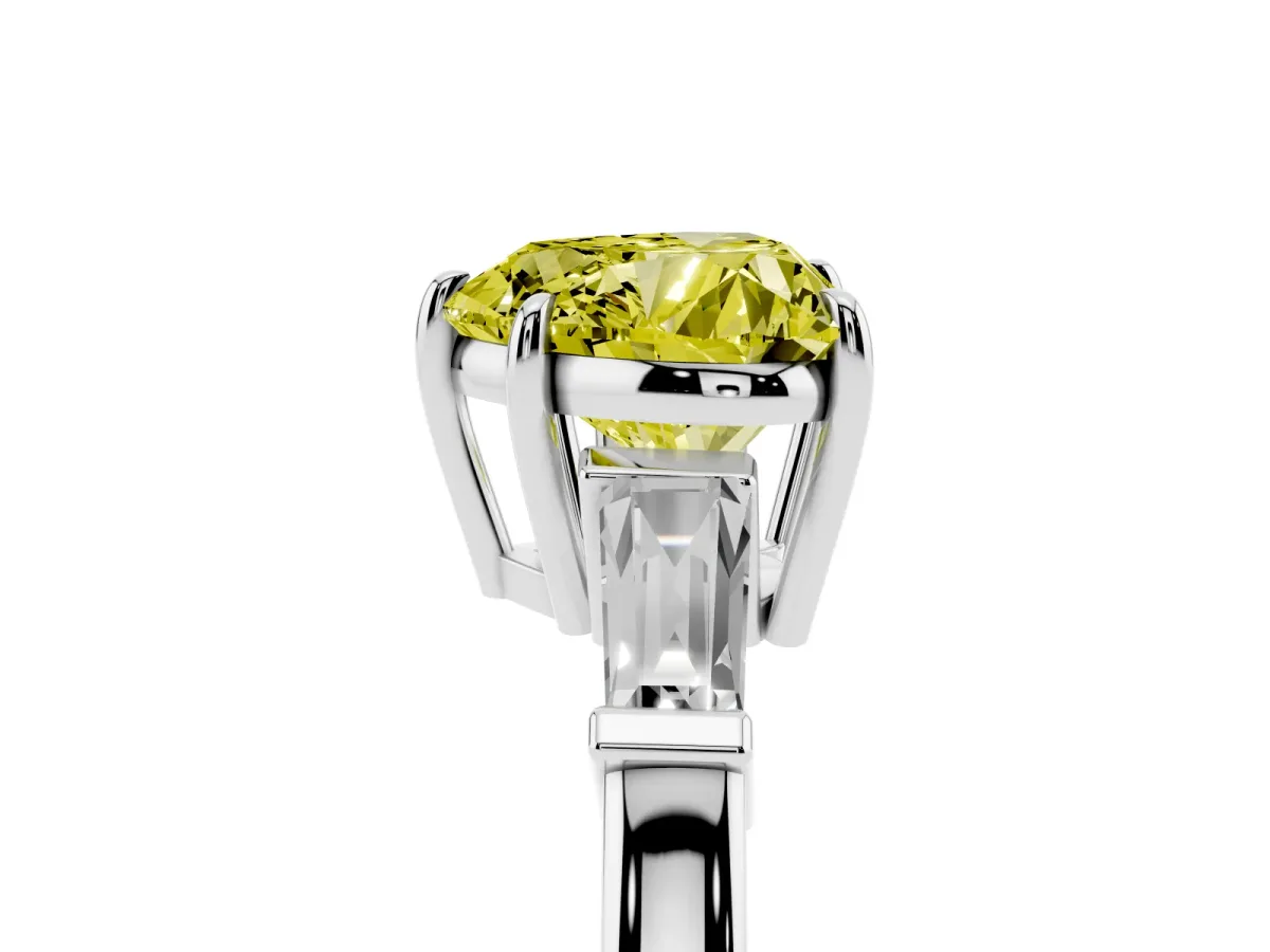 Fancy Yellow Heart Cut Diamond Three-Stone Ring with Tapered Baguette Side Stones and Prong Setting White gold