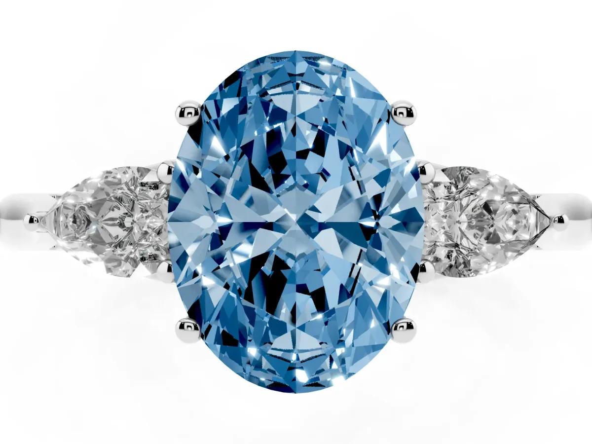 Fancy Blue Three-Stone Oval Cut Brilliant Diamond Solitaire Ring with Tapered Band and Four-Prong Setting Platinum