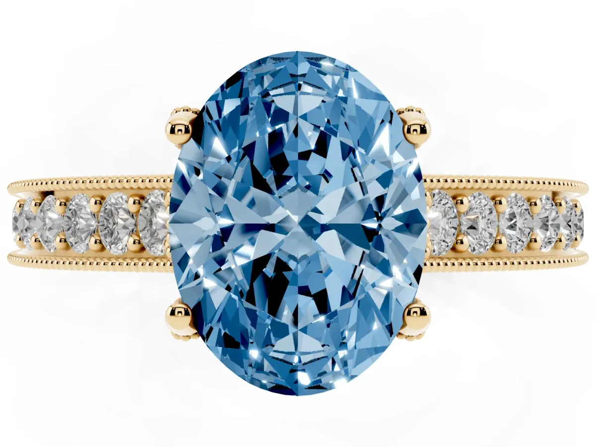 Fancy Blue Oval Cut Cut Diamond Solitaire Ring with Milgrain Pave Band and Four Prong Setting Yellow gold