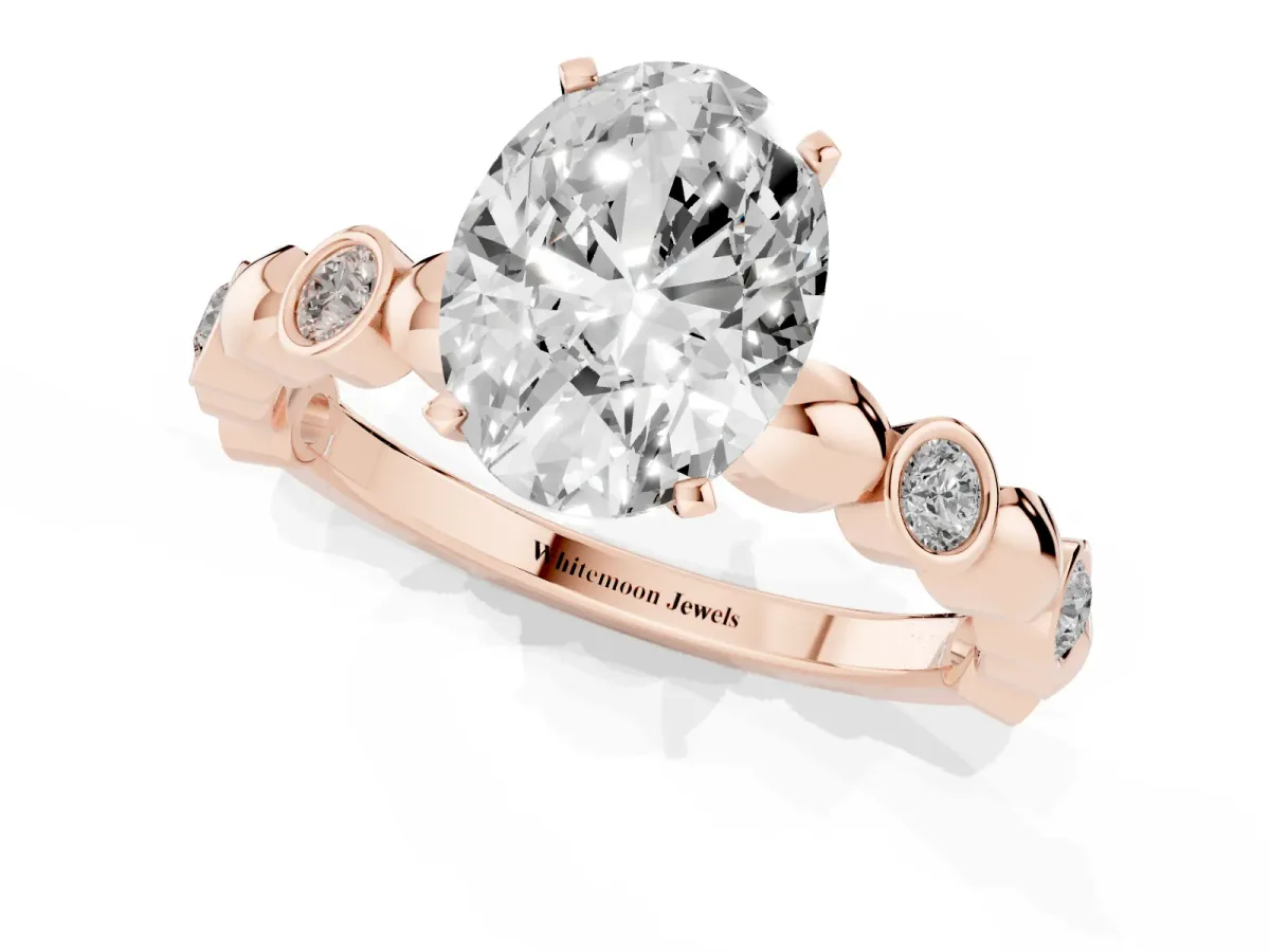 Oval Cut Solitaire Bezel-Set Diamond Ring with Beaded Band and Four-Prong Setting Rose gold