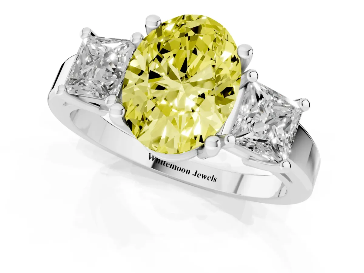 Fancy Yellow Three-Stone Oval Cut Cut Solitaire Ring with Prong Setting Platinum