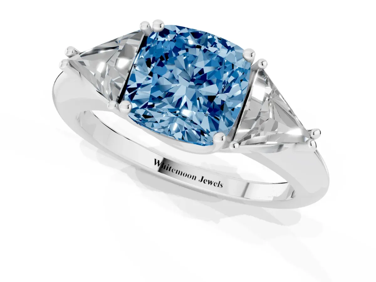 Fancy Blue Three-Stone Cushion Cut Diamond Engagement Ring with Trillion Side Stones and Prong Setting Silver