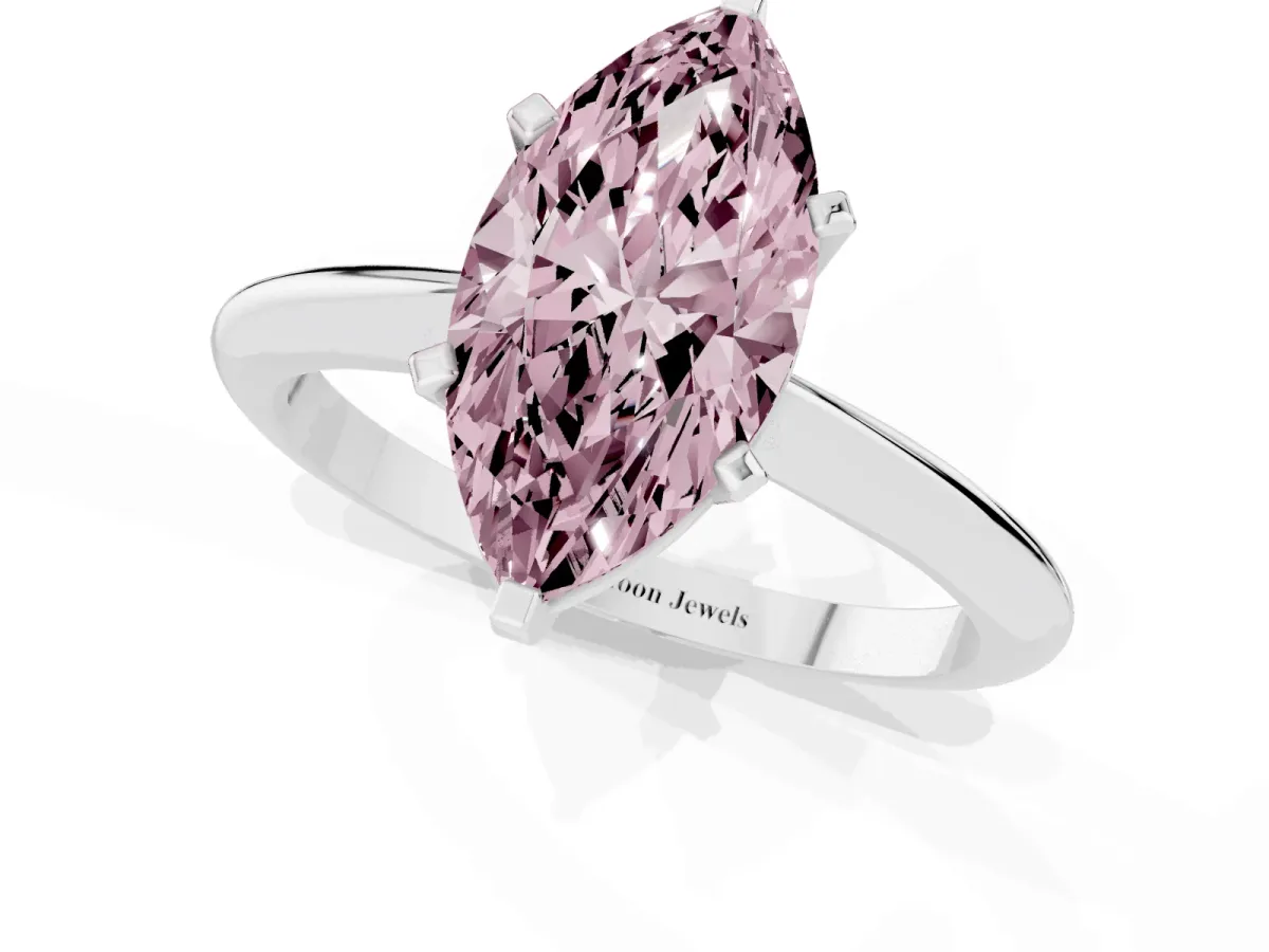 Fancy Pink Marquise Cut Cut Solitaire Ring with Four-Prong Setting on a Classic Band Silver