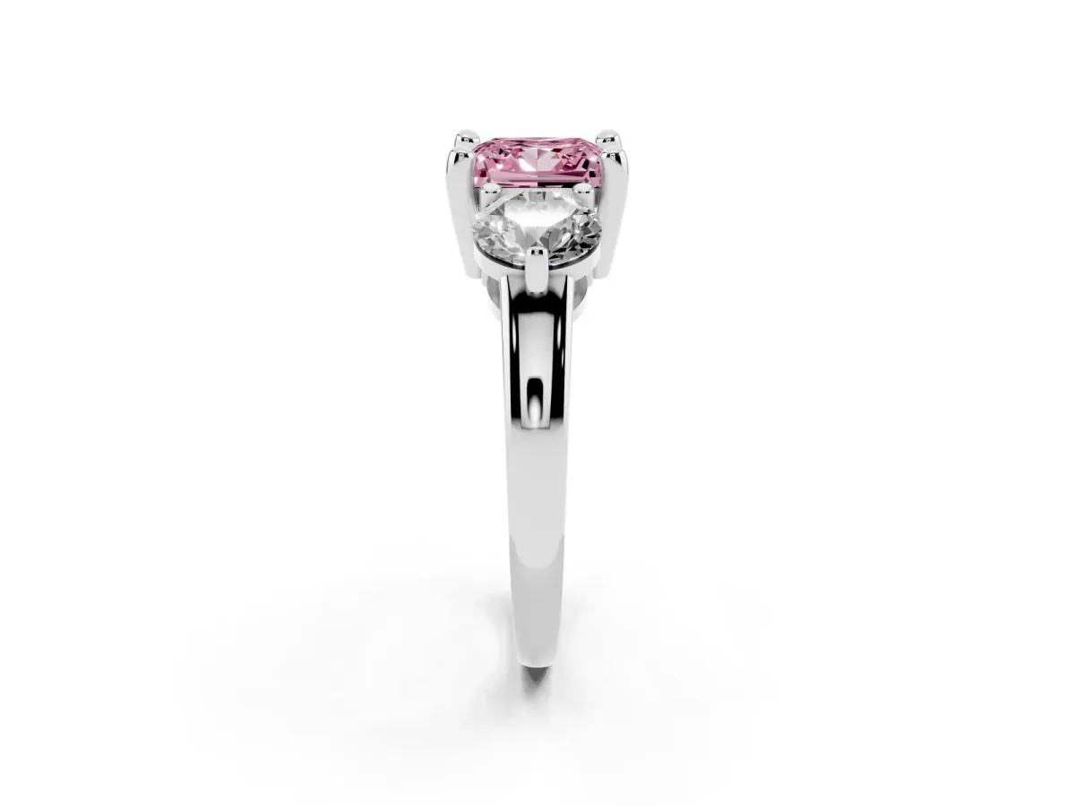 Fancy Pink Three-Stone Princess Cut Brilliant Cut Solitaire Ring with Prong Setting on a Classic Band Silver
