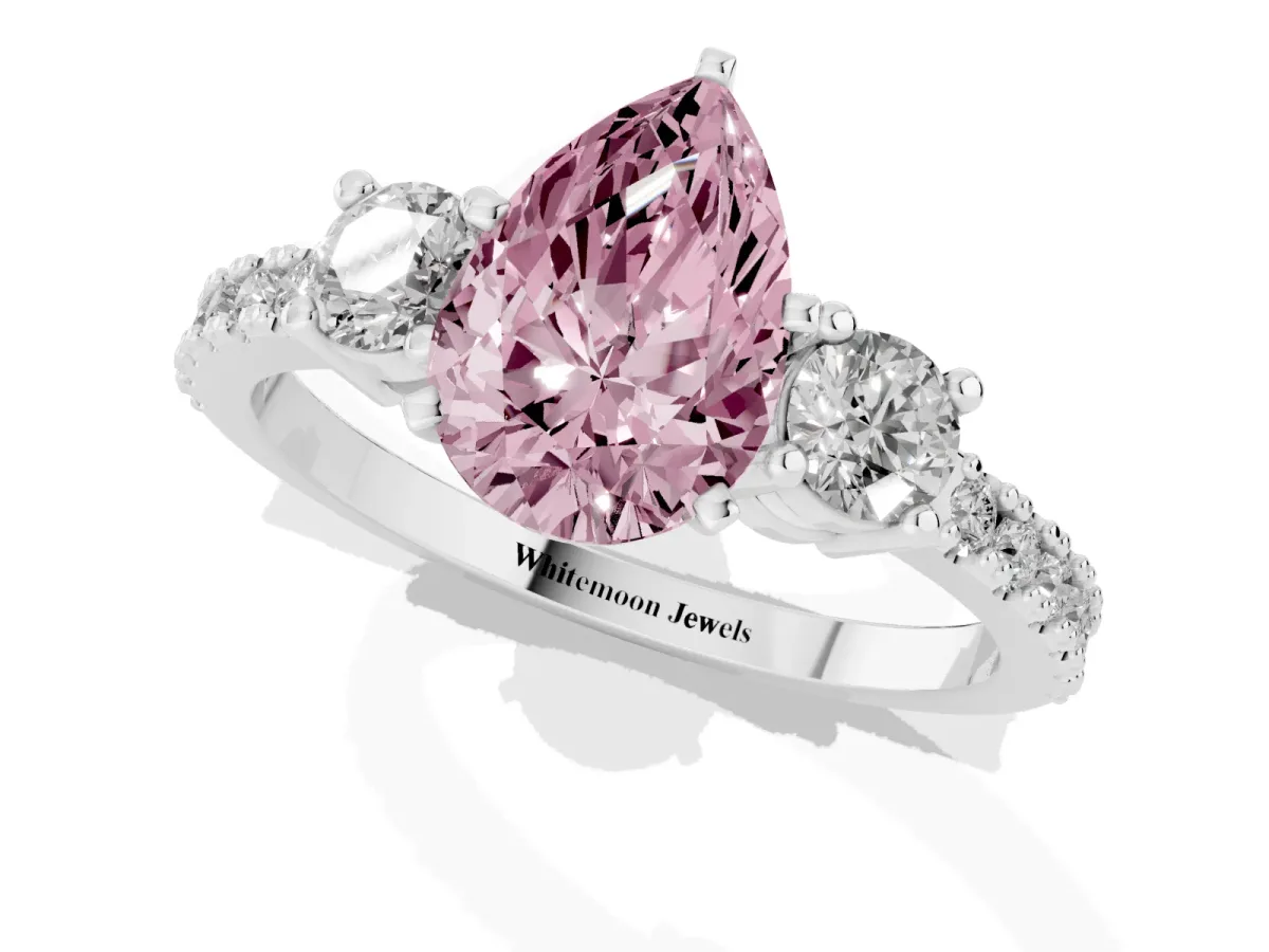 Fancy Pink Pear Cut Three-Stone Diamond Pavé Band with Prong Setting Platinum